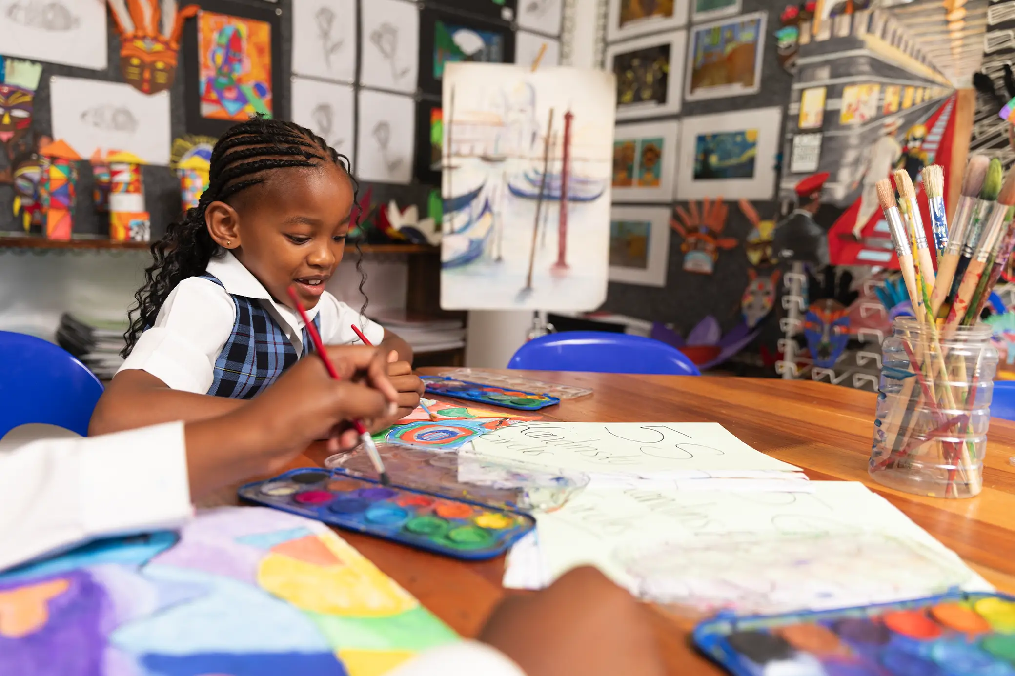 Student painting in the art room at Summerhill